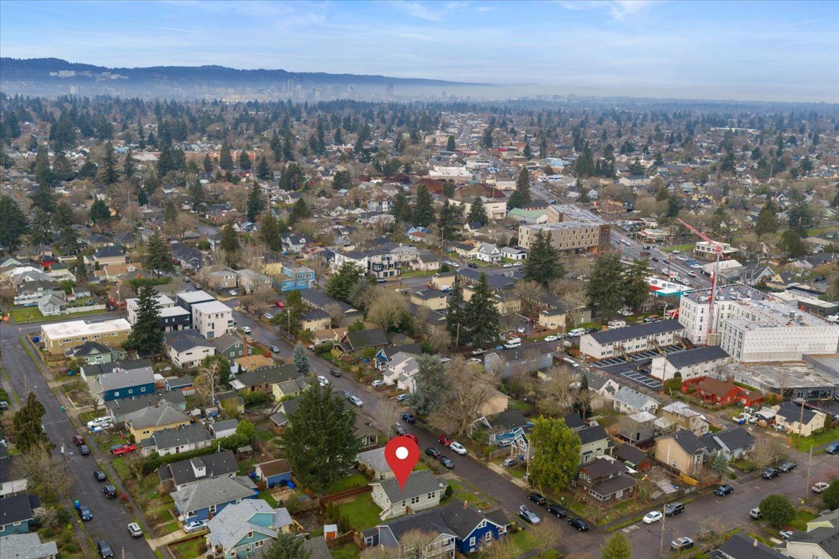 Aerial view of the neighborhood with downtown Portland skyline